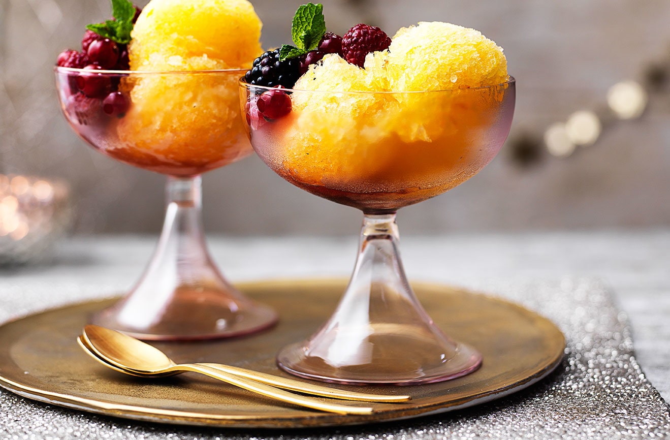 Image of "Prosecco and tangerine sorbet with red berries"