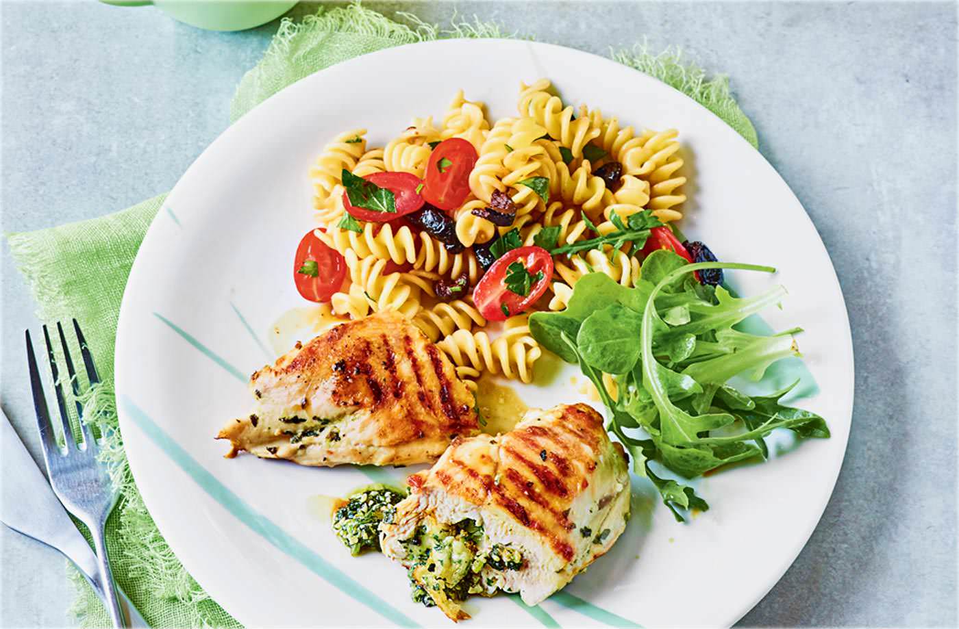 Basil and mozzarella stuffed chicken with pasta salad