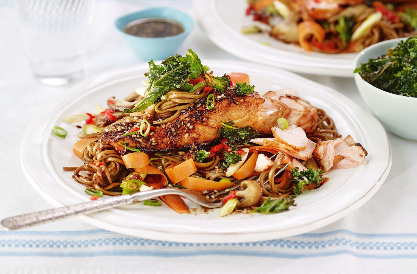 Soy and sesame salmon with noodles and crispy kale