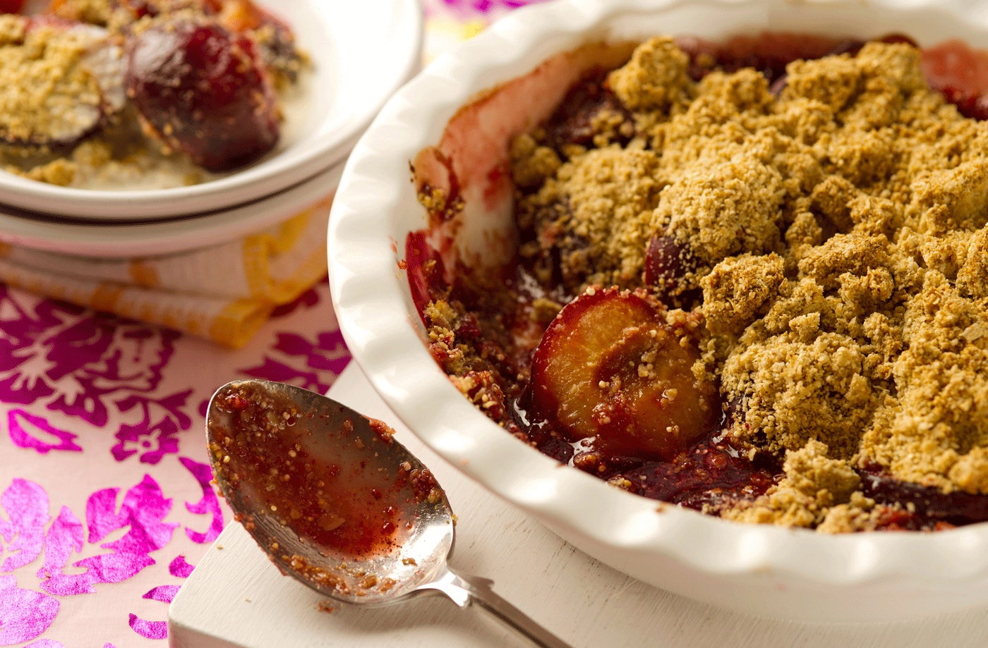 Gluten-free plum, quinoa and oat crumble