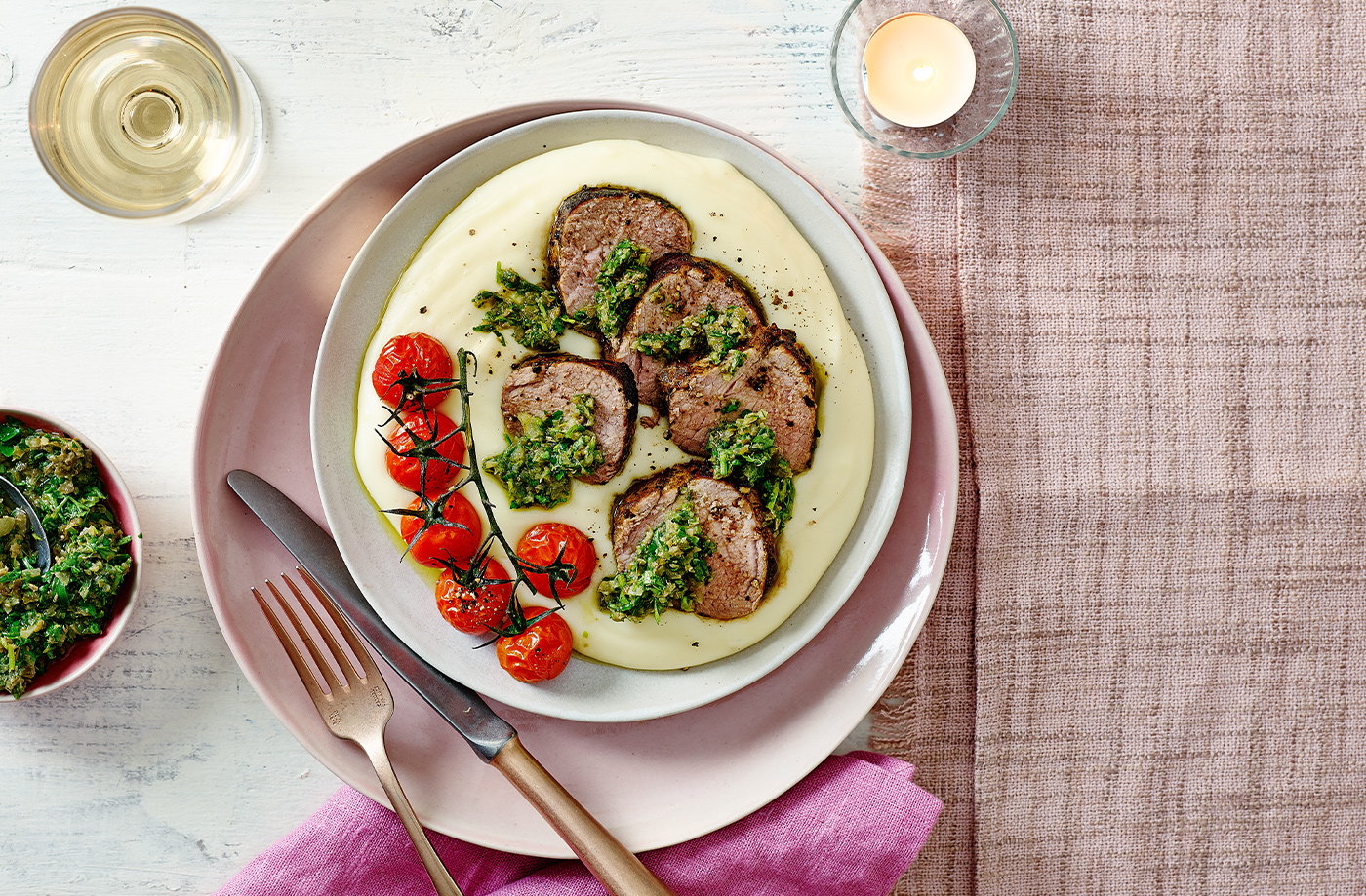 Aligot with roast pork and tarragon salsa verde