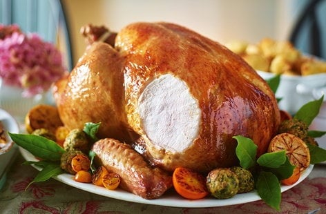 Image of "Roast turkey with citrus butter, pistachio stuffing and cranberry gravy"