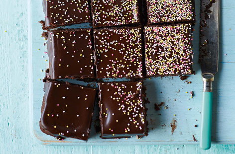 Image of "Frosted brownies with hundreds and thousands"