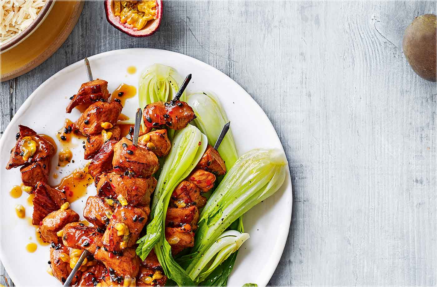 Passion fruit glazed pork skewers