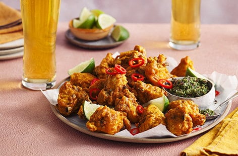 Image of "Pakora chicken with a green chutney"