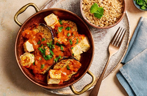 Image of "Dina Begum's roasted aubergine and paneer curry bowls"