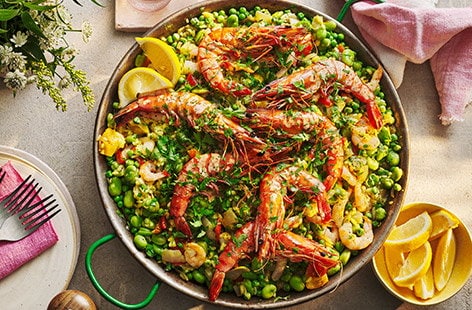 Image of "BBQ prawn, pea and lemon paella"