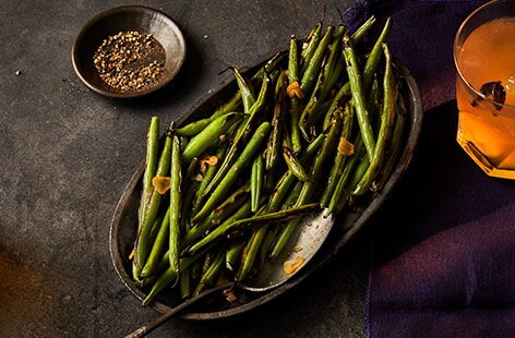 Image of "Charred garlicky green beans"