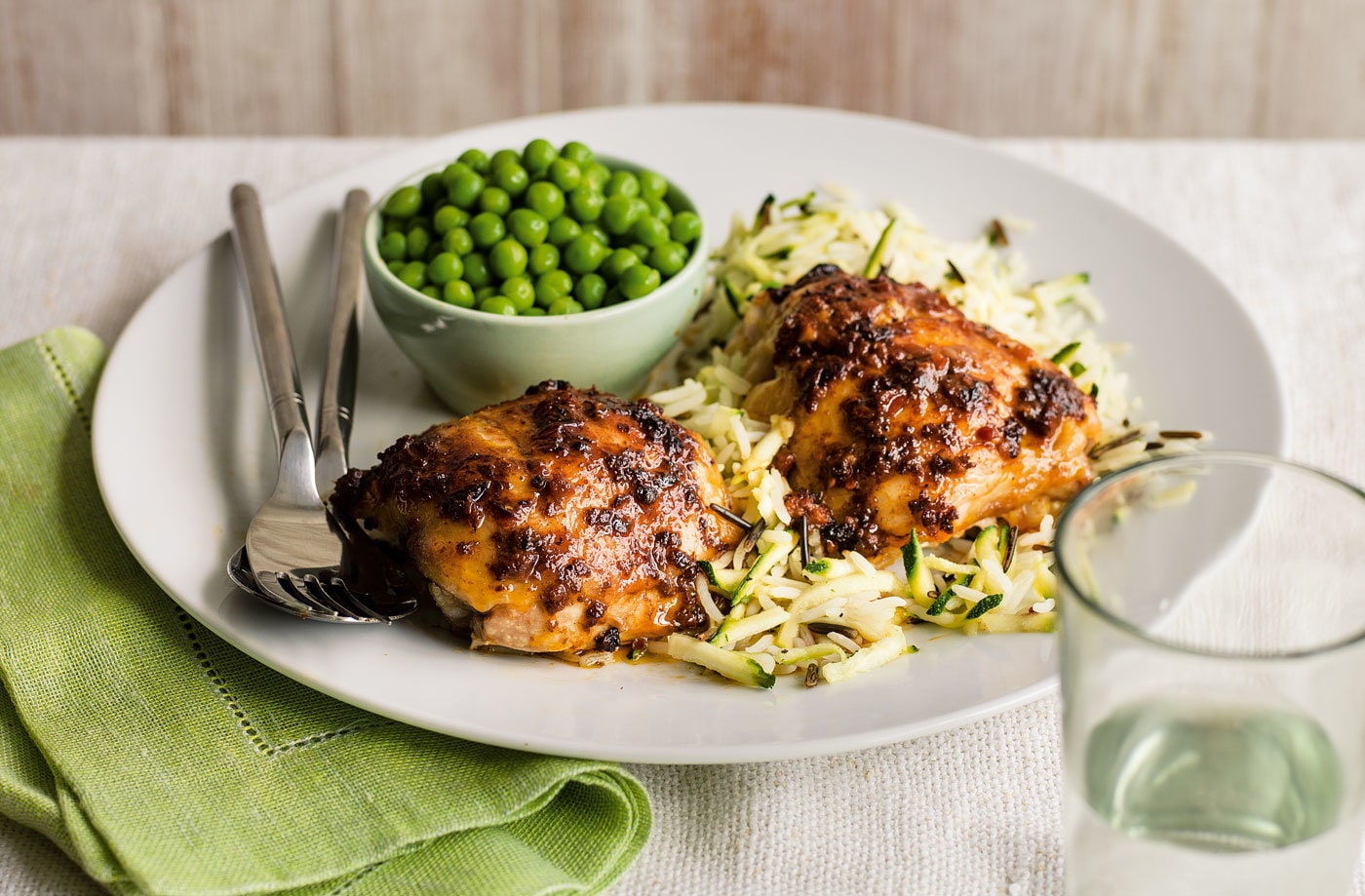 Jerk chicken with courgette wild rice and garden peas