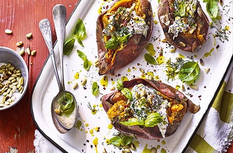 Image of "Charred sweet potatoes with tahini yogurt"