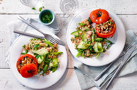 Image of "Turkey-stuffed tomatoes with wholewheat couscous salad"
