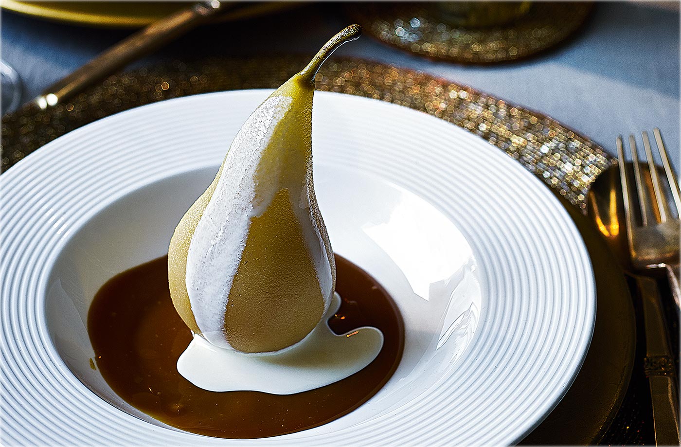 Vanilla poached pears with salted caramel sauce