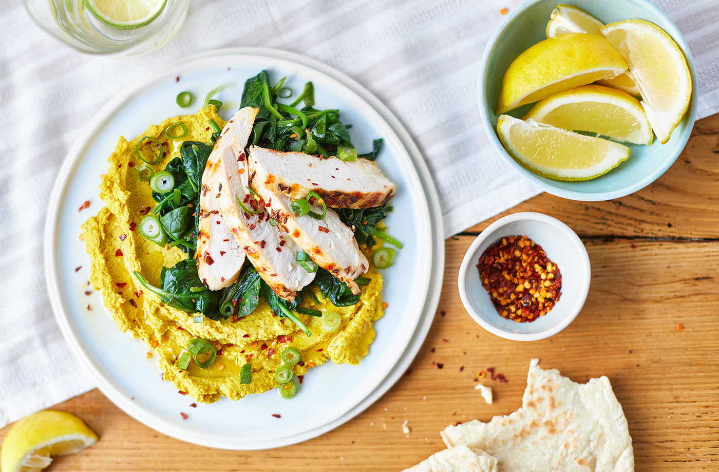 Grilled chicken with spinach and curried houmous