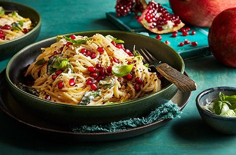 Image of "Pomegranate, ricotta and walnut spaghetti"