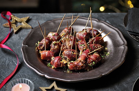 Image of "Maple glazed bacon-wrapped dates"