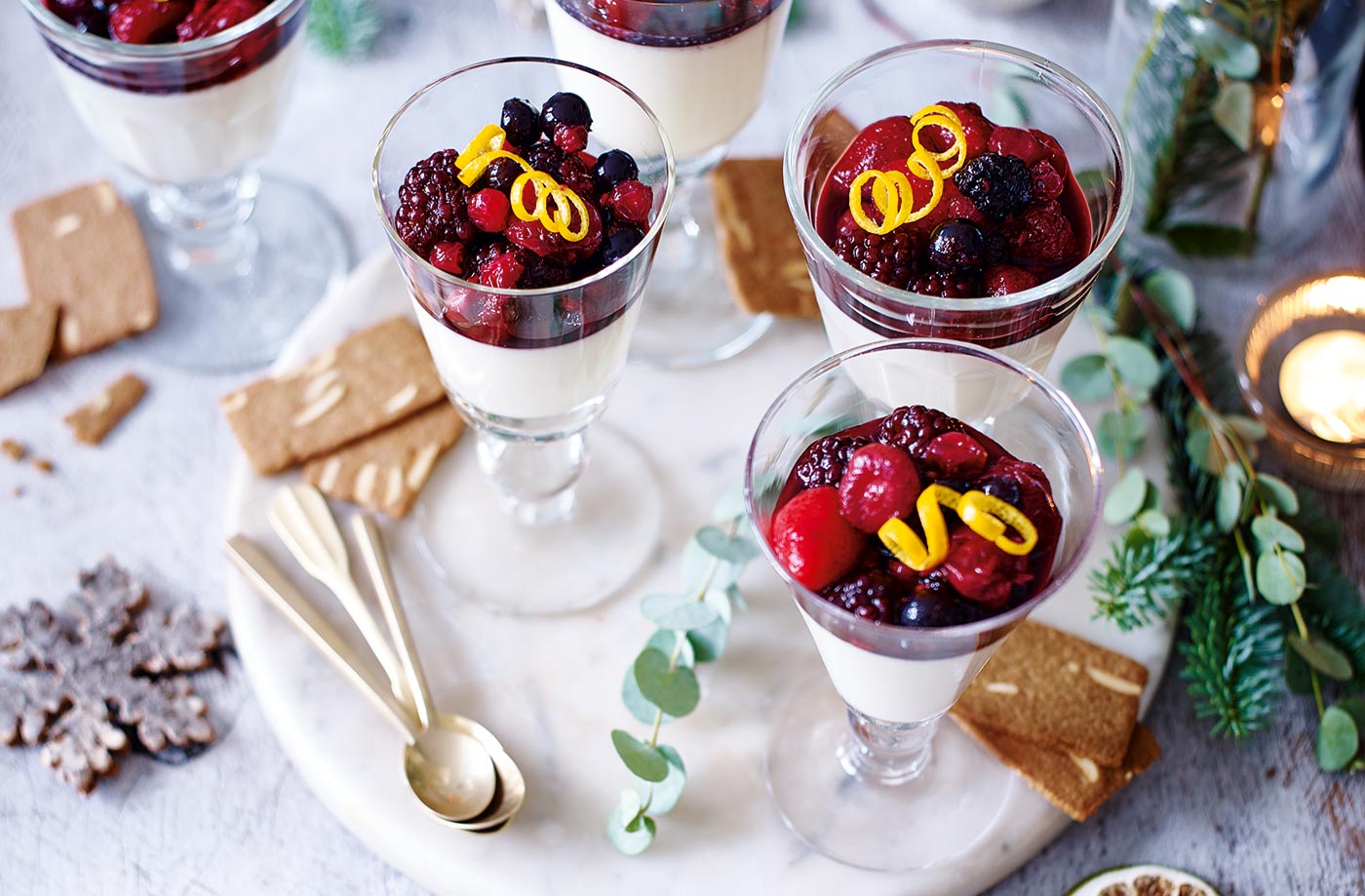 Creamy eggnog panna cottas with mulled berry compote