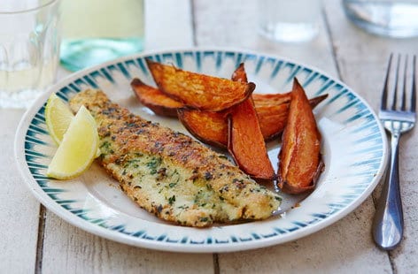 Image of "Gluten-free almond crusted fish and sweet potato wedges"