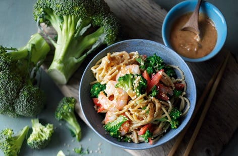 Image of "Broccoli, pepper and prawn noodles with peanut dressing"