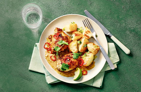 Image of "Satay chicken with spring onion roasties"