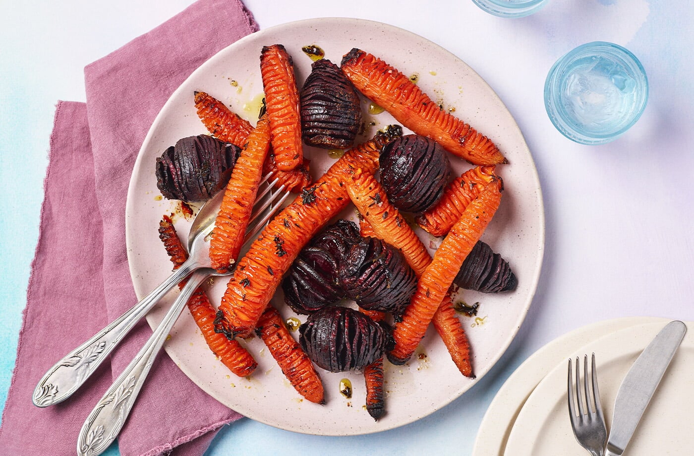 Sticky hasselback beetroot and carrots