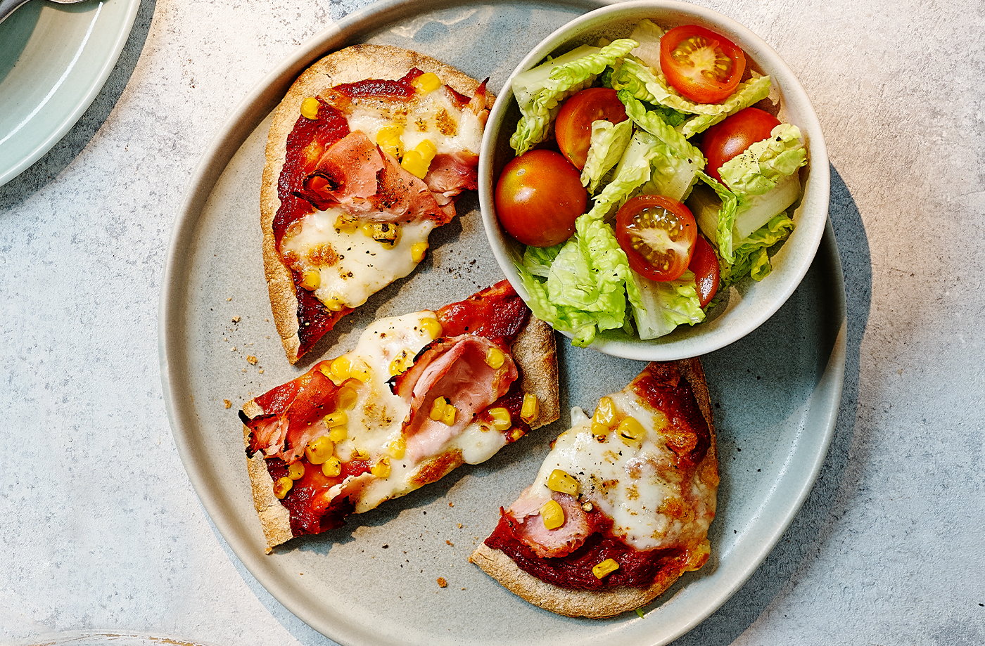 Ham and sweetcorn pitta pizzas