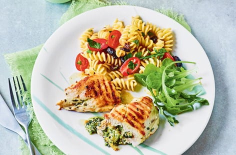Image of "Basil and mozzarella stuffed chicken with pasta salad"