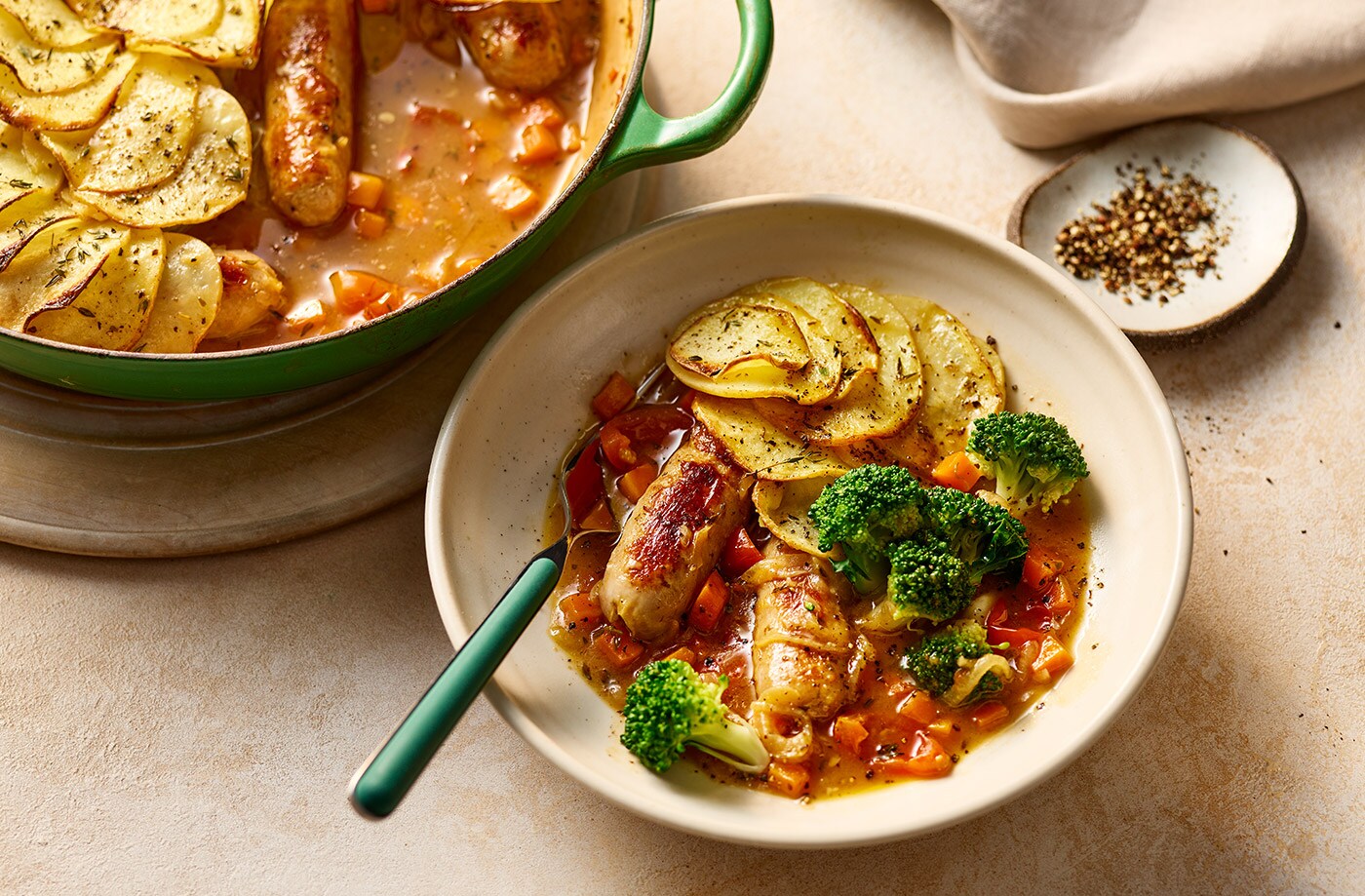 Caramelised onion and sausage hotpot
