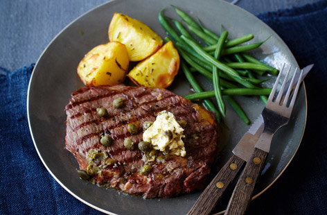 Image of "Tesco Finest griddled steak with caper butter, green beans and crisp potatoes"