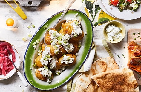 Image of "Loaded hasselback potatoes"