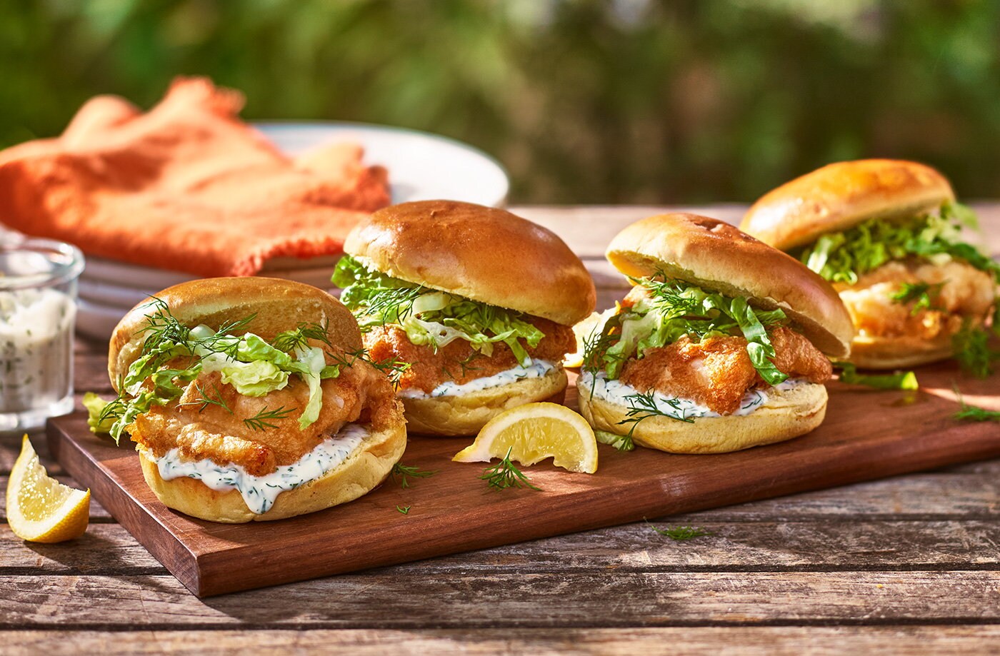Crispy fish sliders with herb yogurt mayo