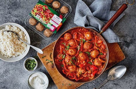 Image of "Vegan meatball and tomato spiced curry"