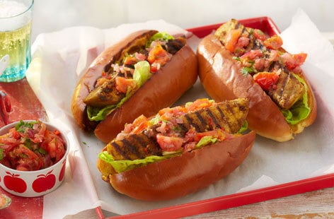 Image of "Spiced aubergine hot dogs with hot salsa"
