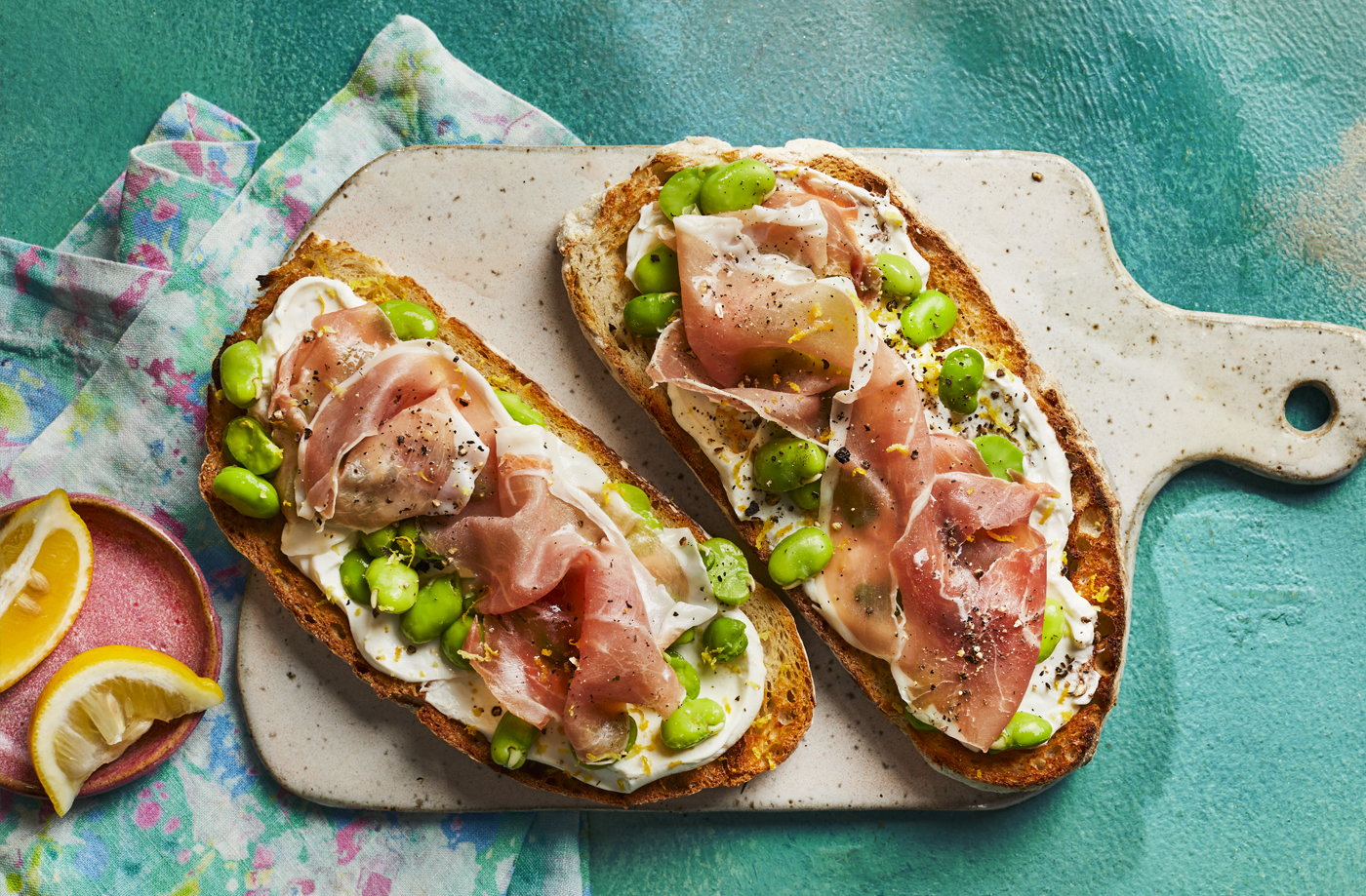Serrano ham, lemon cream cheese and broad bean toasts