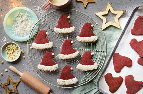 Image of "Red velvet Santa hat cookies"